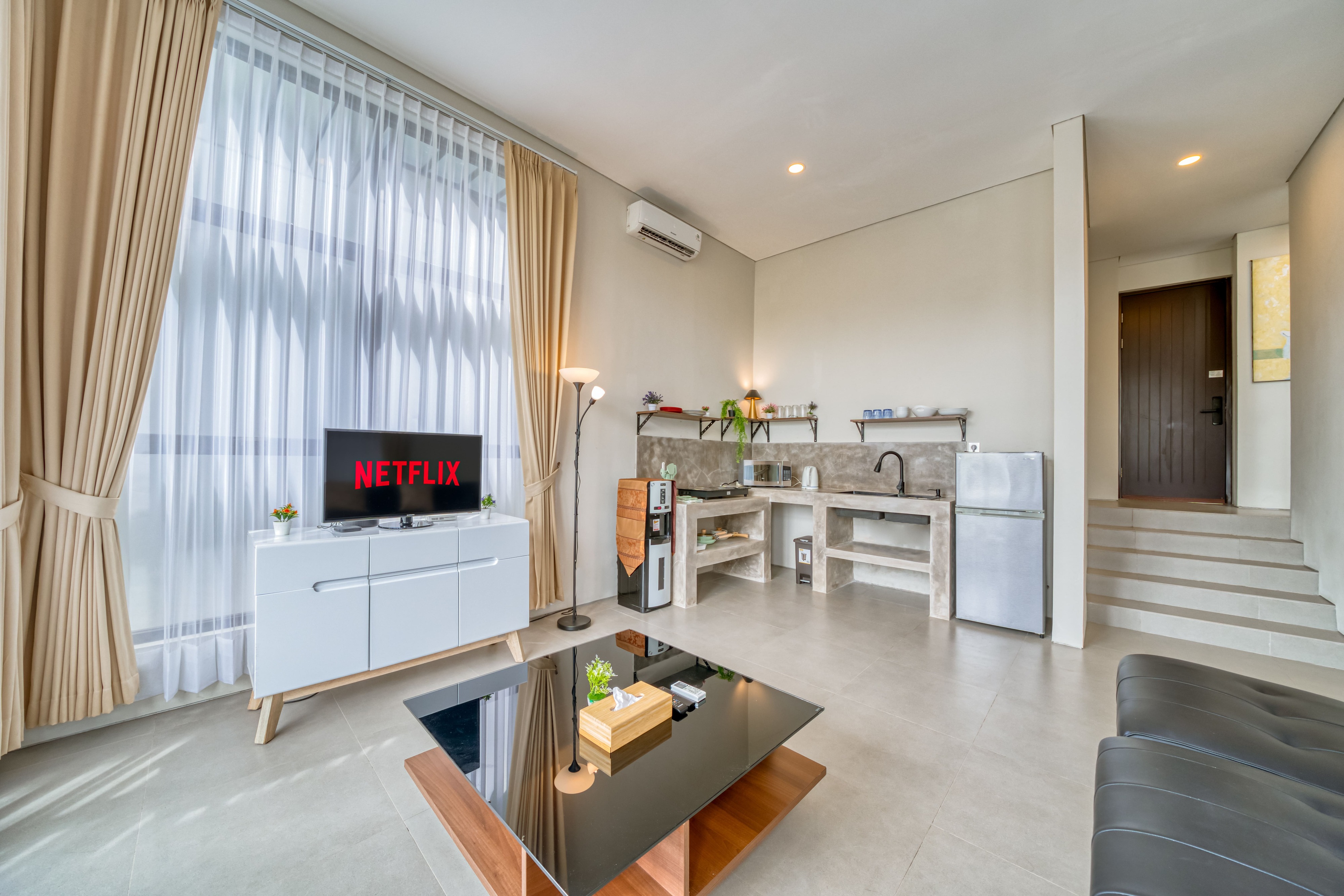 Living and dining room, Residence at Damara Village